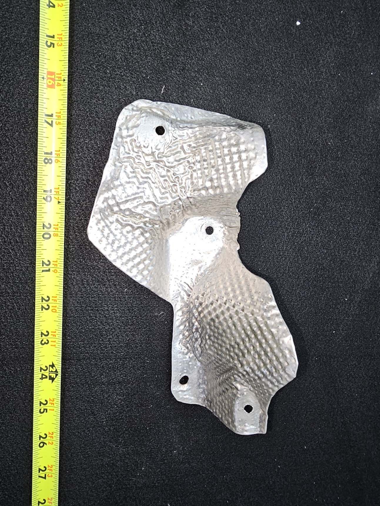 SPI Exhaust Wrap Thin Gauge Metal Stamping